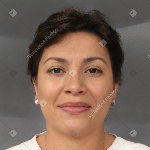 Joyful white adult female with short  brown hair and brown eyes