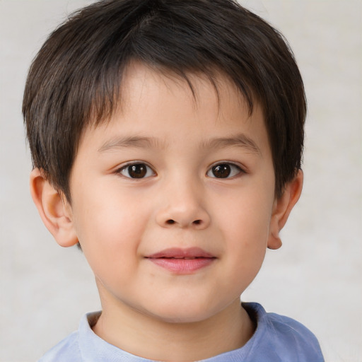 Joyful white child male with short  brown hair and brown eyes