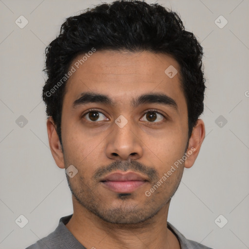 Neutral latino young-adult male with short  black hair and brown eyes