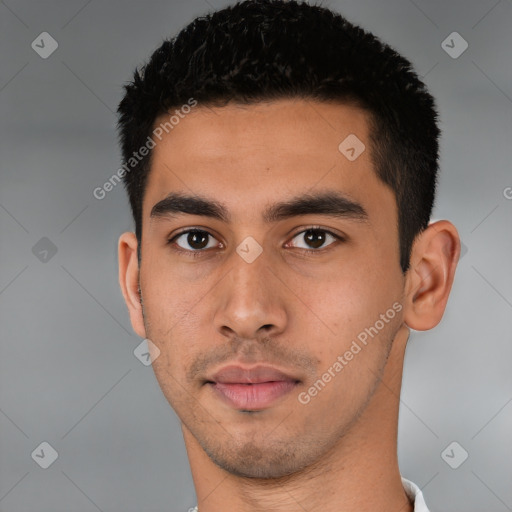 Neutral latino young-adult male with short  black hair and brown eyes