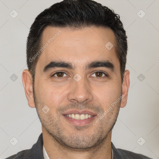 Joyful white young-adult male with short  brown hair and brown eyes