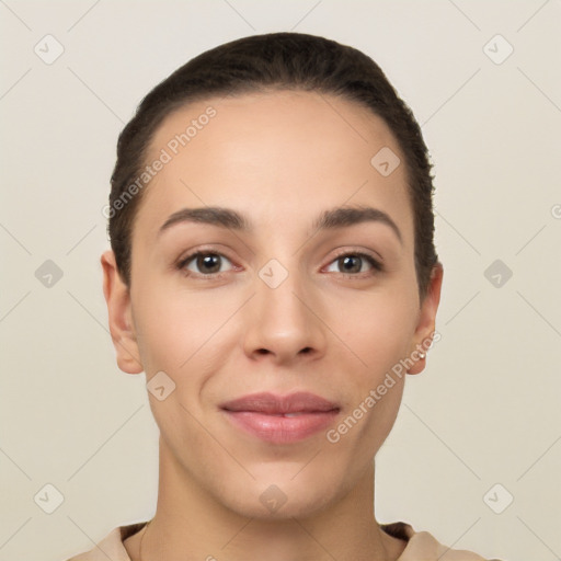 Joyful white young-adult female with short  black hair and brown eyes