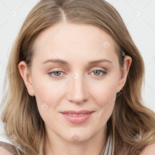 Joyful white young-adult female with long  brown hair and blue eyes