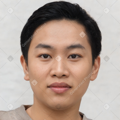 Joyful asian young-adult male with short  black hair and brown eyes