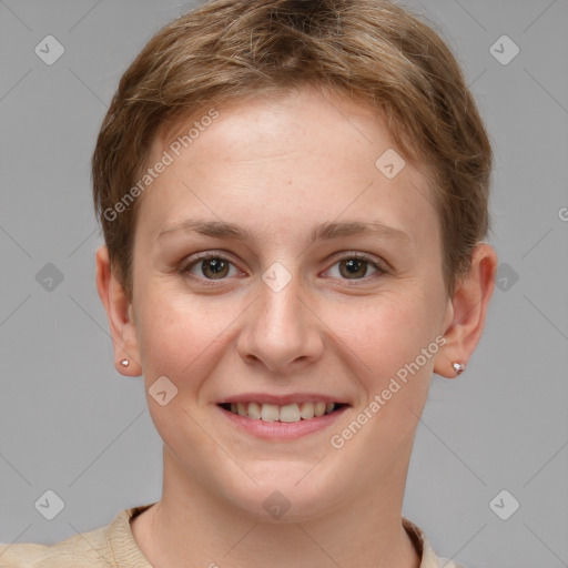 Joyful white young-adult female with short  brown hair and grey eyes