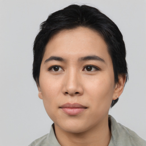 Neutral asian young-adult female with medium  black hair and brown eyes