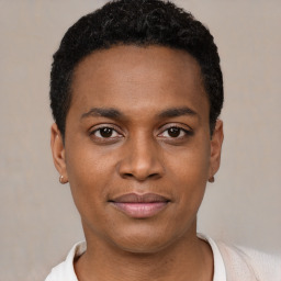 Joyful black young-adult male with short  black hair and brown eyes