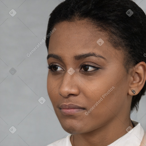 Neutral black young-adult female with short  brown hair and brown eyes