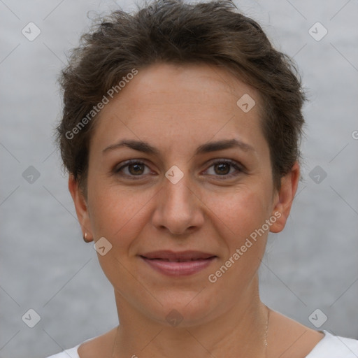 Joyful white adult female with short  brown hair and brown eyes