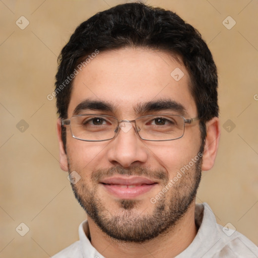 Joyful white adult male with short  black hair and brown eyes