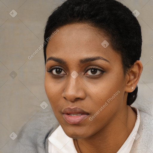 Neutral black young-adult female with short  black hair and brown eyes