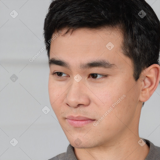 Neutral white young-adult male with short  black hair and brown eyes