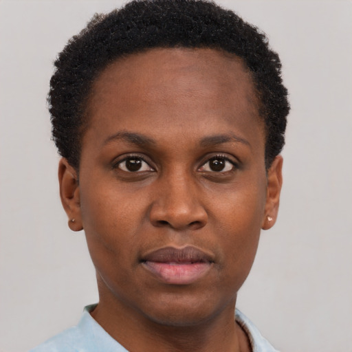 Neutral black young-adult female with short  brown hair and brown eyes