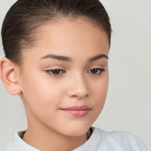 Joyful white child female with short  brown hair and brown eyes