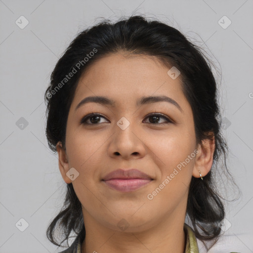 Joyful latino young-adult female with medium  brown hair and brown eyes