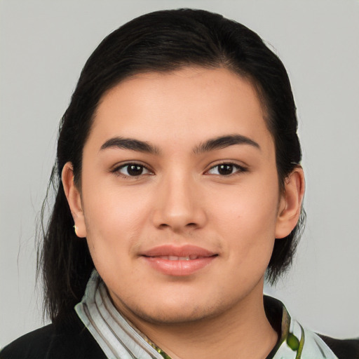 Joyful white young-adult female with long  black hair and brown eyes