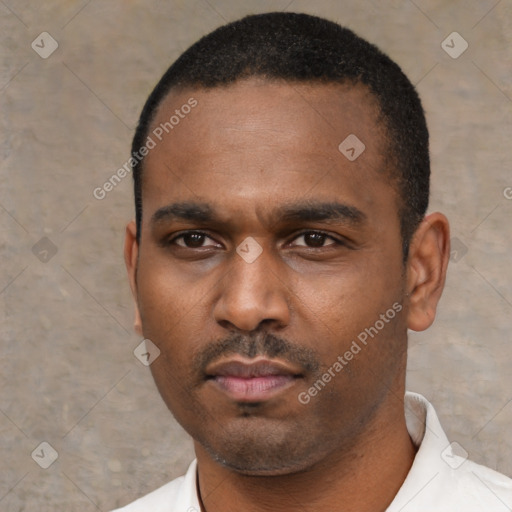 Neutral black young-adult male with short  black hair and brown eyes