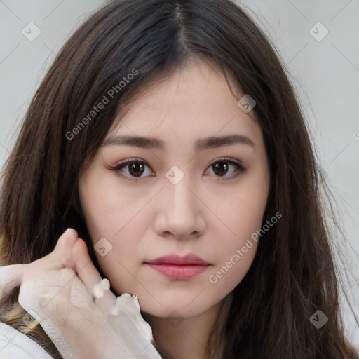 Neutral white young-adult female with long  brown hair and brown eyes