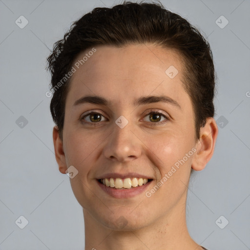 Joyful white young-adult female with short  brown hair and brown eyes