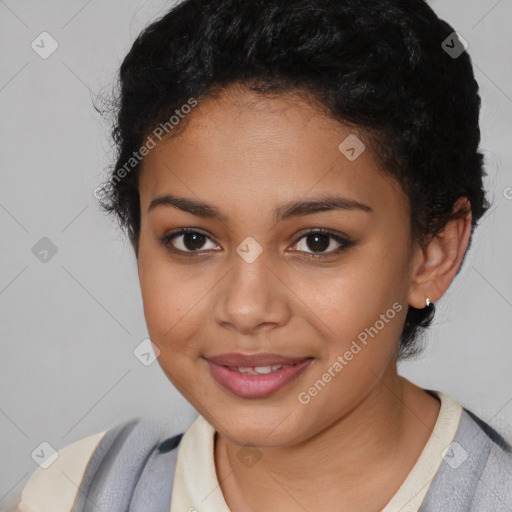 Joyful latino young-adult female with short  brown hair and brown eyes