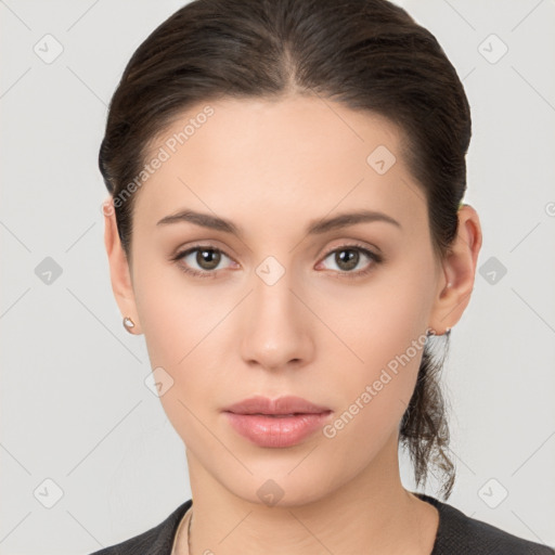 Neutral white young-adult female with medium  brown hair and brown eyes