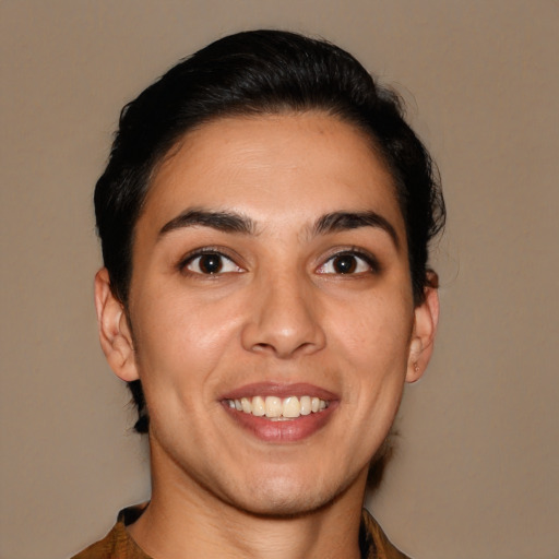 Joyful latino young-adult female with short  brown hair and brown eyes