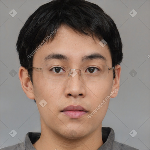 Neutral asian young-adult male with short  brown hair and brown eyes