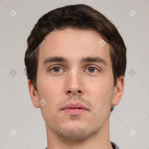 Neutral white young-adult male with short  brown hair and brown eyes