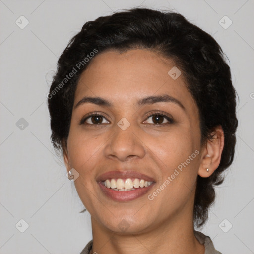 Joyful latino young-adult female with medium  black hair and brown eyes