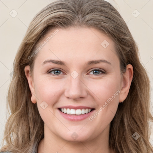 Joyful white young-adult female with long  brown hair and grey eyes