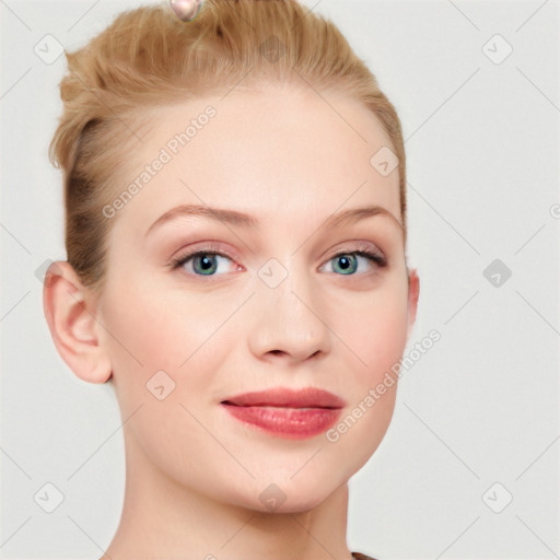 Joyful white young-adult female with short  brown hair and blue eyes