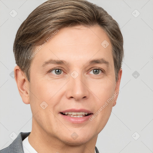 Joyful white adult male with short  brown hair and grey eyes