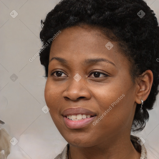 Joyful black young-adult female with medium  black hair and brown eyes