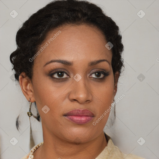 Joyful latino adult female with medium  brown hair and brown eyes