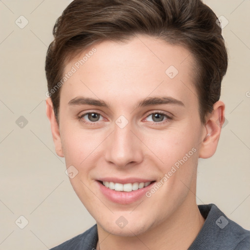 Joyful white young-adult female with short  brown hair and grey eyes