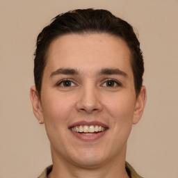 Joyful white young-adult male with short  brown hair and brown eyes