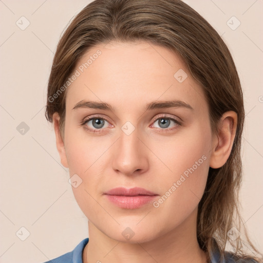 Neutral white young-adult female with medium  brown hair and grey eyes