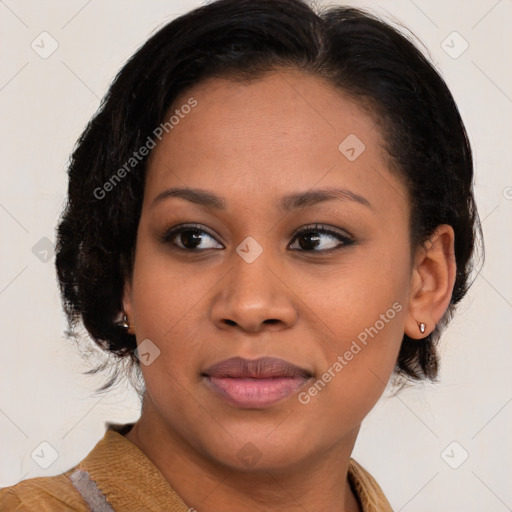 Joyful black young-adult female with medium  brown hair and brown eyes