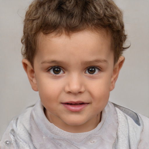 Joyful white child male with short  brown hair and brown eyes