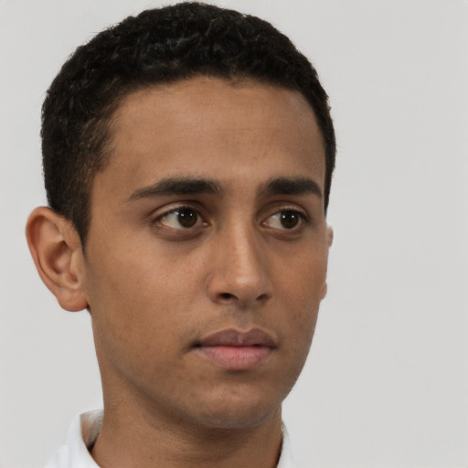 Neutral latino young-adult male with short  brown hair and brown eyes