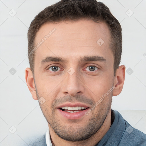 Joyful white young-adult male with short  brown hair and brown eyes