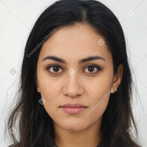 Joyful latino young-adult female with long  brown hair and brown eyes