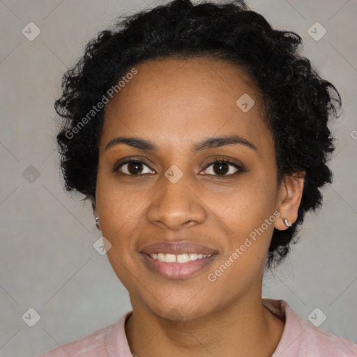 Joyful black young-adult female with medium  black hair and brown eyes