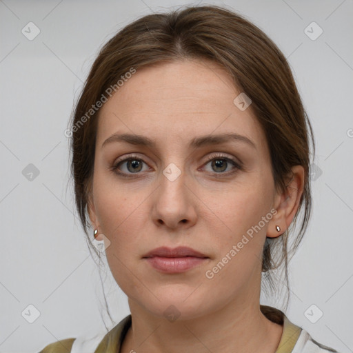 Neutral white young-adult female with medium  brown hair and grey eyes