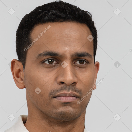 Neutral latino young-adult male with short  black hair and brown eyes
