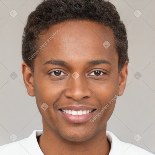 Joyful black young-adult male with short  brown hair and brown eyes