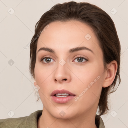 Neutral white young-adult female with medium  brown hair and brown eyes