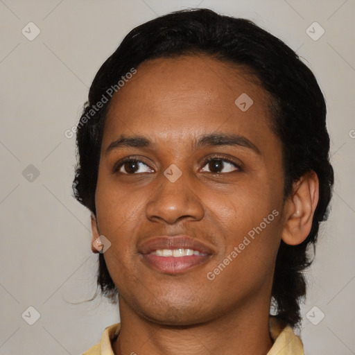 Joyful black young-adult female with medium  black hair and brown eyes