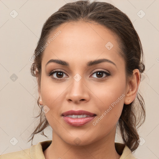 Joyful white young-adult female with medium  brown hair and brown eyes