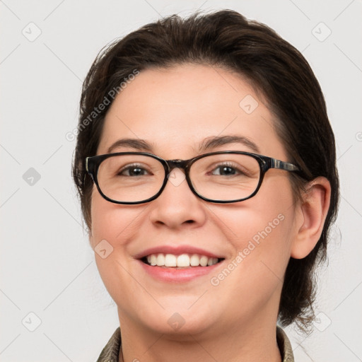 Joyful white young-adult female with medium  brown hair and blue eyes